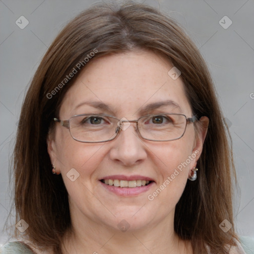 Joyful white adult female with medium  brown hair and grey eyes