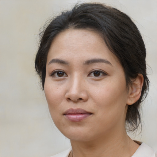 Neutral asian young-adult female with medium  brown hair and brown eyes