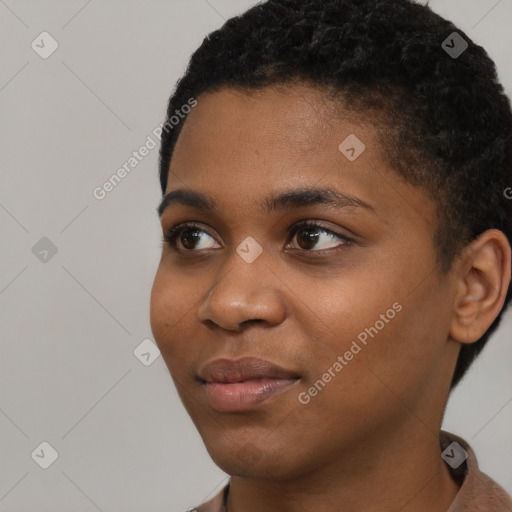 Joyful black young-adult female with short  black hair and brown eyes