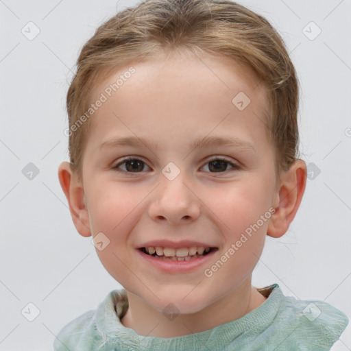 Joyful white child male with short  brown hair and brown eyes