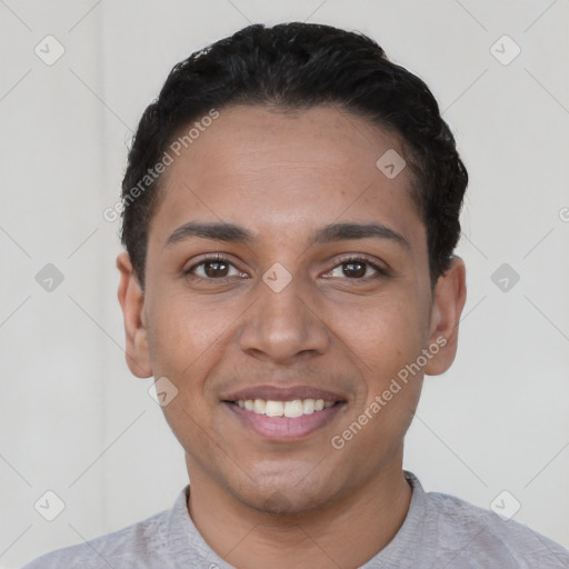 Joyful latino young-adult male with short  black hair and brown eyes