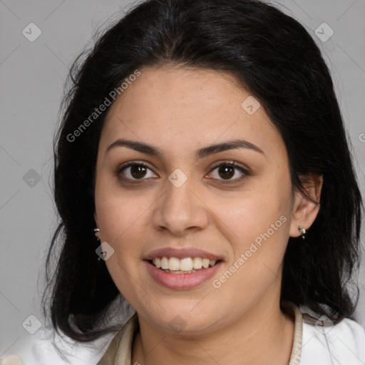 Joyful latino young-adult female with medium  brown hair and brown eyes