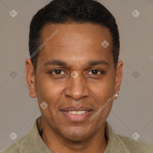 Joyful latino young-adult male with short  brown hair and brown eyes