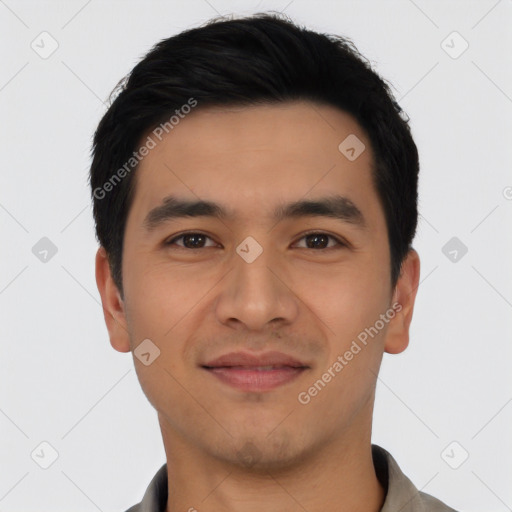 Joyful asian young-adult male with short  black hair and brown eyes