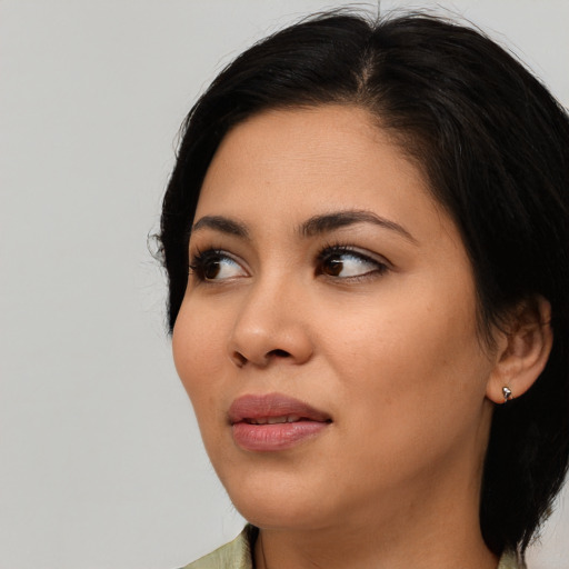 Neutral asian young-adult female with medium  black hair and brown eyes