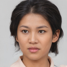 Neutral asian young-adult female with medium  brown hair and brown eyes