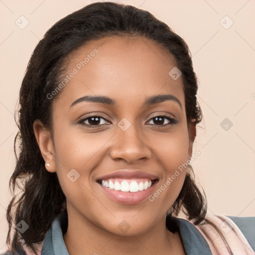 Joyful latino young-adult female with long  brown hair and brown eyes