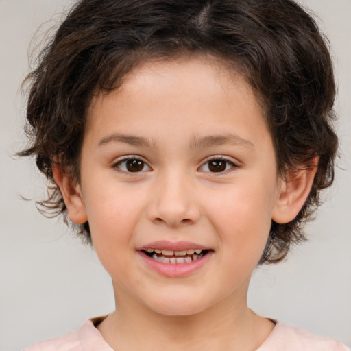 Joyful white child female with medium  brown hair and brown eyes