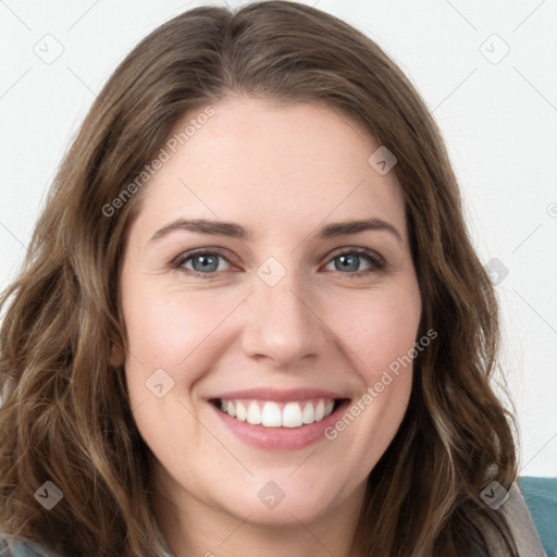 Joyful white young-adult female with long  brown hair and green eyes