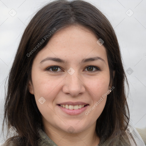 Joyful white young-adult female with long  brown hair and brown eyes