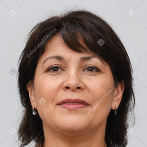 Joyful white adult female with medium  brown hair and brown eyes