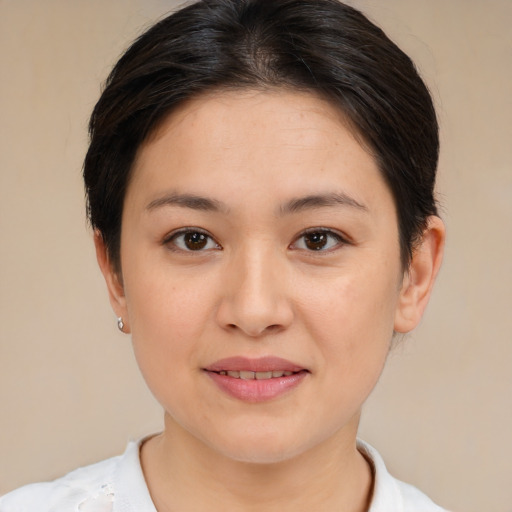 Joyful white young-adult female with medium  brown hair and brown eyes
