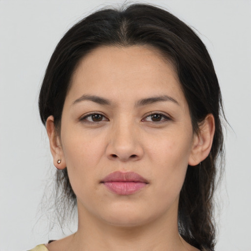 Joyful asian young-adult female with medium  brown hair and brown eyes