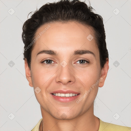 Joyful white young-adult female with short  brown hair and brown eyes