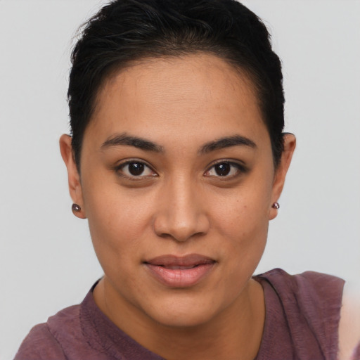 Joyful asian young-adult female with short  brown hair and brown eyes