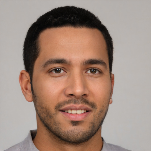 Neutral white young-adult male with short  black hair and brown eyes