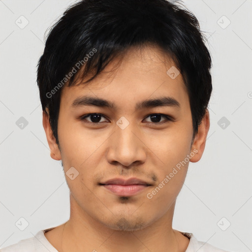 Joyful asian young-adult male with short  black hair and brown eyes