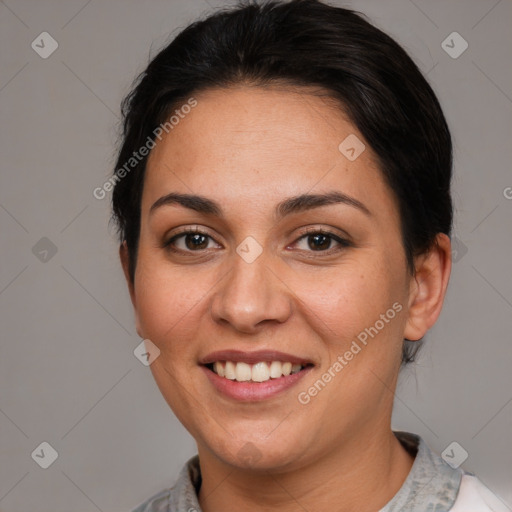 Joyful white adult female with short  brown hair and brown eyes