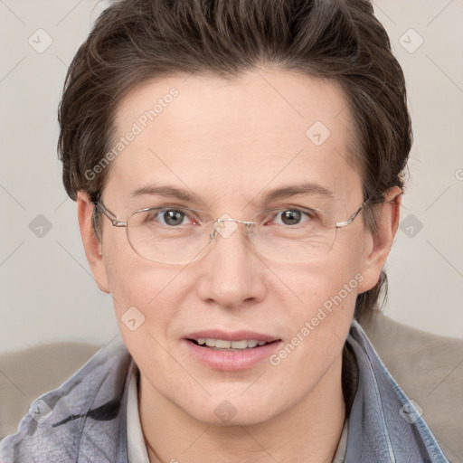 Joyful white adult female with short  brown hair and grey eyes