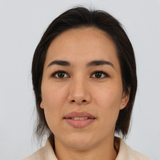 Joyful asian young-adult female with medium  brown hair and brown eyes