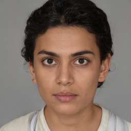 Neutral white young-adult female with short  brown hair and brown eyes