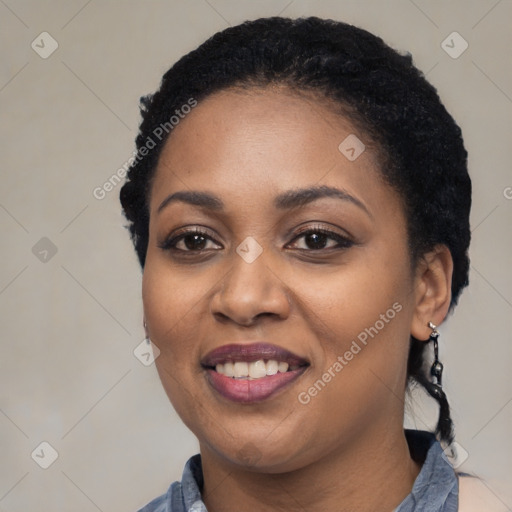 Joyful latino young-adult female with long  black hair and brown eyes