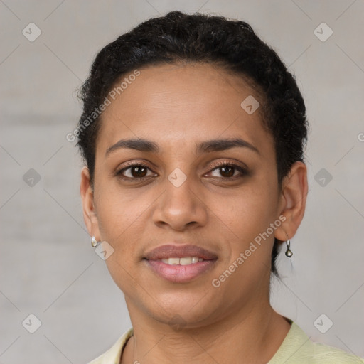 Joyful latino young-adult female with short  brown hair and brown eyes