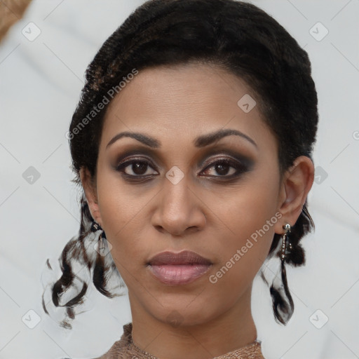 Joyful black young-adult female with medium  brown hair and brown eyes