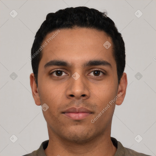 Neutral latino young-adult male with short  black hair and brown eyes