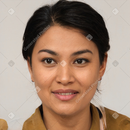 Joyful latino young-adult female with medium  brown hair and brown eyes