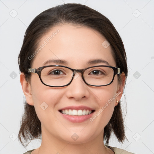 Joyful white young-adult female with medium  brown hair and grey eyes