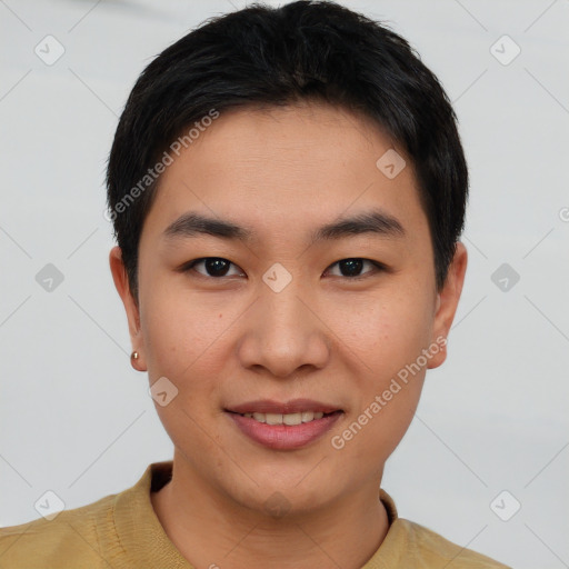 Joyful asian young-adult male with short  brown hair and brown eyes