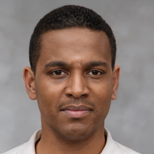 Neutral latino young-adult male with short  brown hair and brown eyes