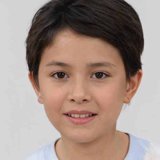 Joyful white child female with short  brown hair and brown eyes