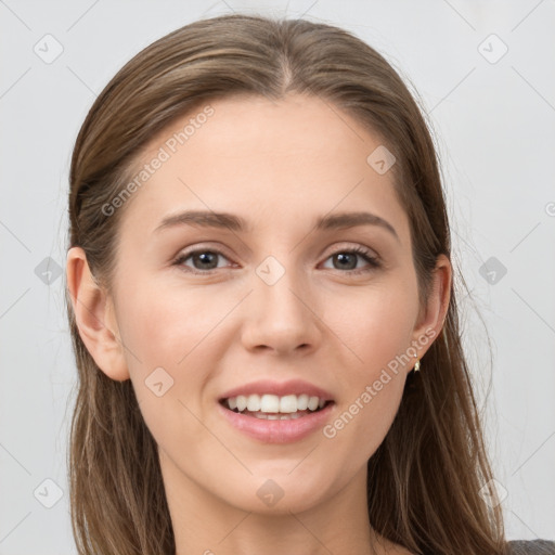 Joyful white young-adult female with long  brown hair and grey eyes