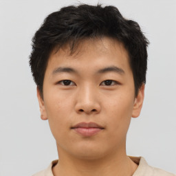 Neutral asian young-adult male with short  brown hair and brown eyes