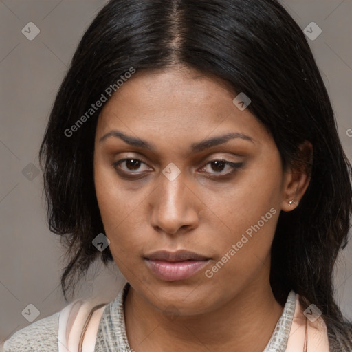 Joyful black young-adult female with medium  brown hair and brown eyes