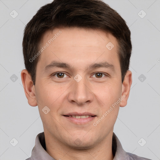 Joyful white young-adult male with short  brown hair and brown eyes