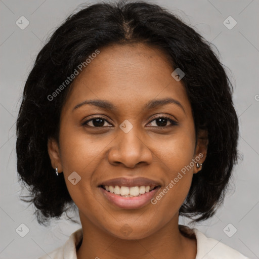 Joyful black young-adult female with medium  brown hair and brown eyes