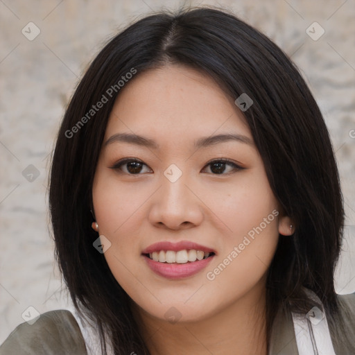 Joyful asian young-adult female with long  brown hair and brown eyes