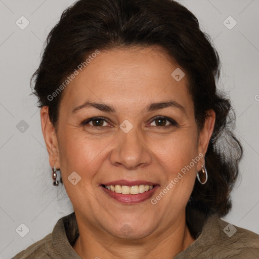 Joyful white adult female with medium  brown hair and brown eyes