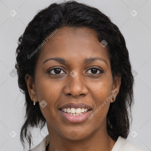 Joyful black young-adult female with medium  brown hair and brown eyes