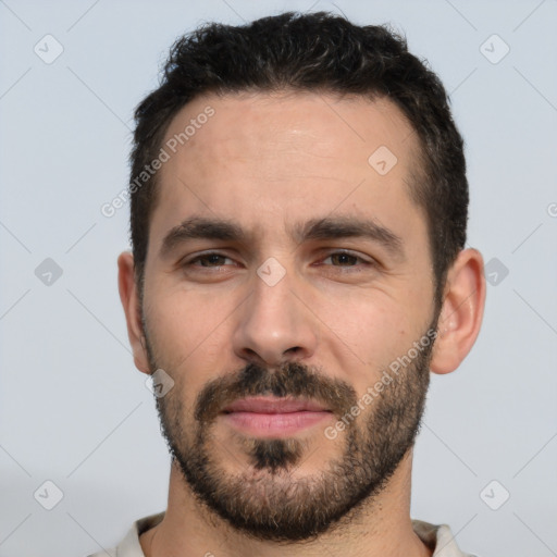 Neutral white young-adult male with short  brown hair and brown eyes