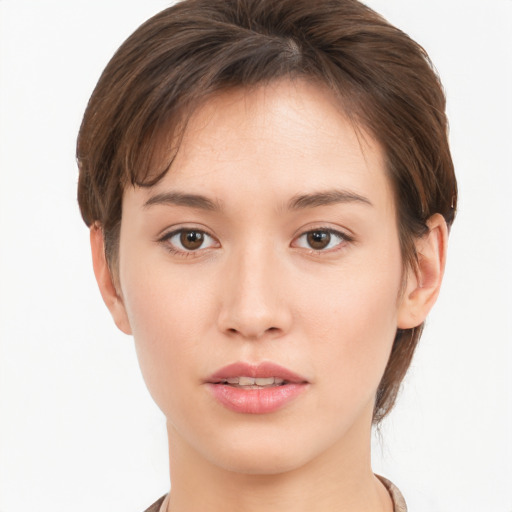 Neutral white young-adult female with short  brown hair and brown eyes