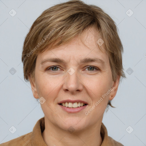 Joyful white adult female with medium  brown hair and grey eyes