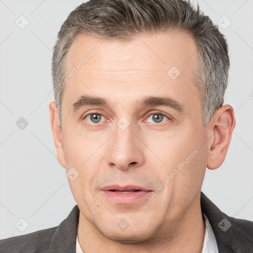 Neutral white adult male with short  brown hair and brown eyes