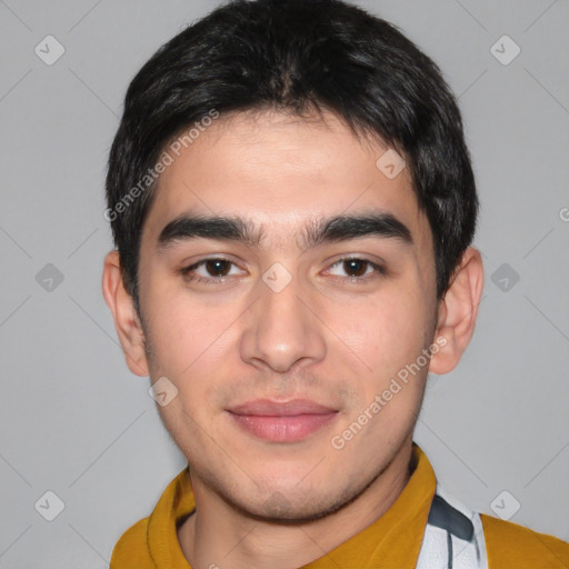 Joyful white young-adult male with short  black hair and brown eyes