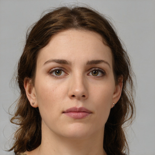 Neutral white young-adult female with medium  brown hair and brown eyes