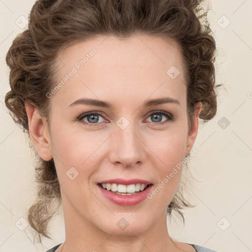 Joyful white young-adult female with medium  brown hair and green eyes