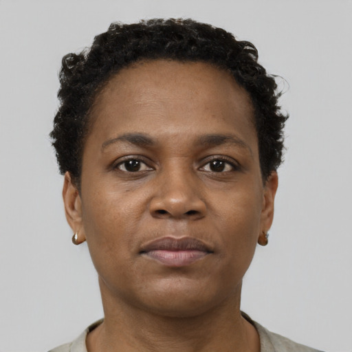 Neutral black young-adult female with short  brown hair and brown eyes
